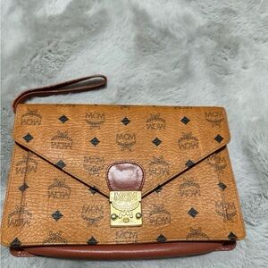 MCM Tan Monogram Clutch Wristlet Firm